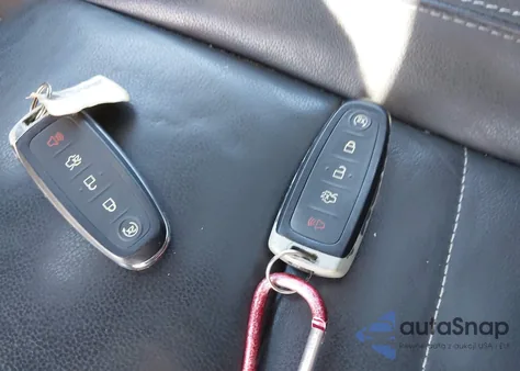 2015 Ford Escape Titanium z USA, uszkodzony, nr VIN 1FMCU9JX2FUA97233